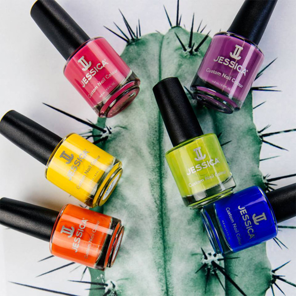 Bright cutom Colour Nail Polish Nail Polishes promped around a cactus