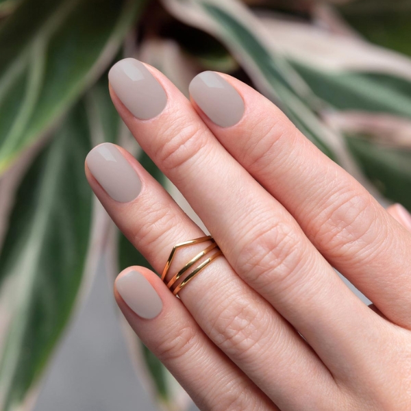 Model wearing Lets Dew This nail polish
