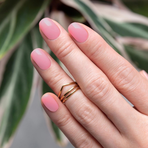 Model wearing Pink-Tacular nail polish